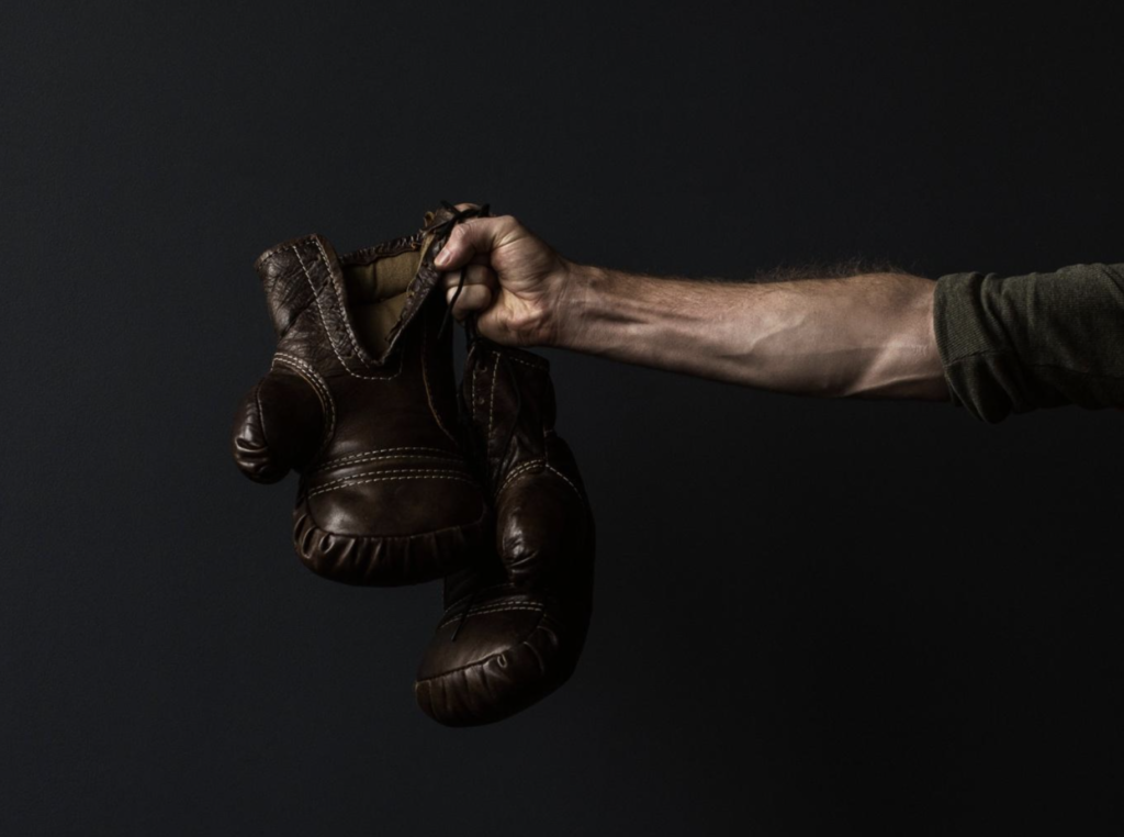 Man holding boxing gloves